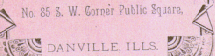 Detail from Reverse:  'No. 35 S. W. Corner Public Square, Danville, Ills.'