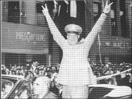 [Two photos of Eisenhower in uniform during his celebratory visit to Kansas.]