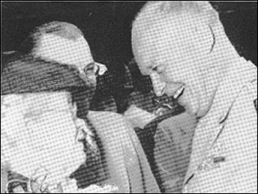 [photos of Eisenhower in uniform during his visit to Kansas, one including his wife, Mamie.]