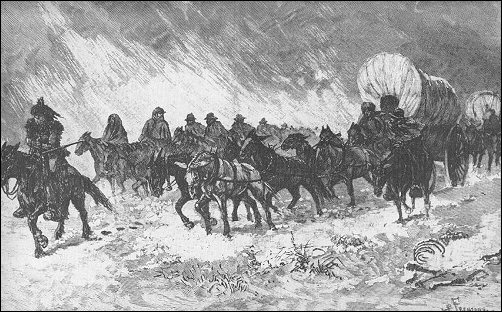 [Wagons pressing on through a blizzard.]